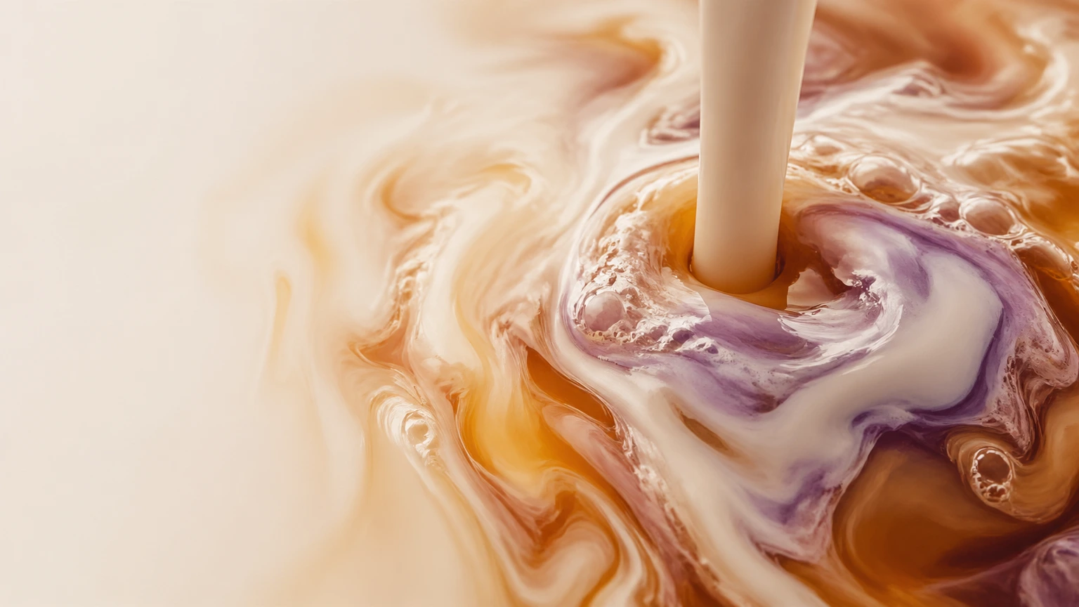 A pour, mid-motion — measurement turning into feeling.